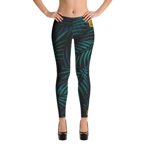 Fashionable women’s leggings with palm leaves print. Trendy womens leggings with floral pattern. Youth leggings with jungle leaves pattern